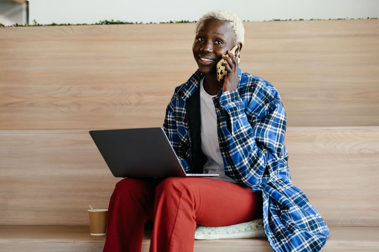 A freelancer on a call with her laptop